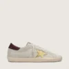 Super-Star CNY för herr i elfenbensfärgat mocka med metallisk läderstjärna och läderflik på hälen
