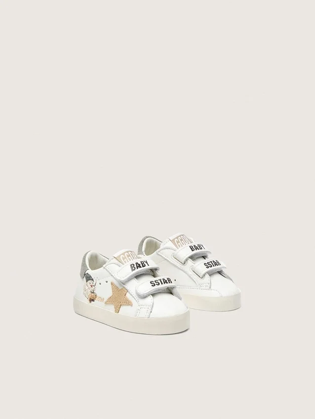 Baby School i nappa med beige stjärna i mocka och maskottryck