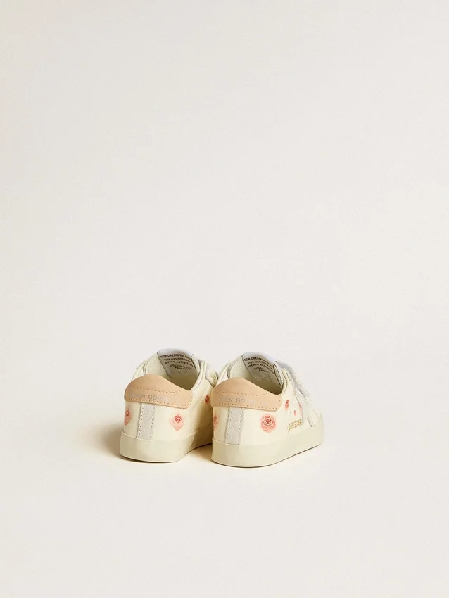 Baby School i nappaläder med rosa rosmotiv och vit stjärna i mocka