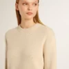 Beige damtröja med ”Golden”-text på ryggen