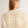 Beige damtröja med ”Golden”-text på ryggen