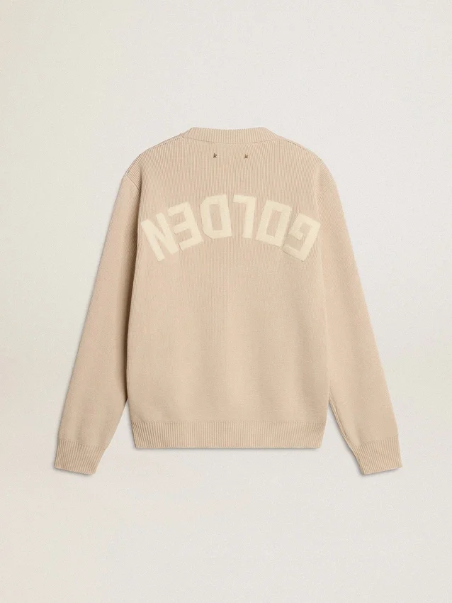 Beige damtröja med ”Golden”-text på ryggen