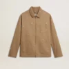 Beige herrjacka med blommig broderi och hel dragkedja