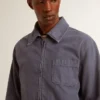 Blå herrjacka i denim av bomull med sliten look