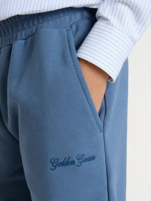 Blå joggingbyxor för barn med broderi