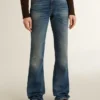 Bootcut-jeans för dam med vintage-tvätt och metalliska detaljer