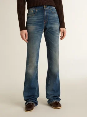 Bootcut-jeans för dam med vintage-tvätt och metalliska detaljer