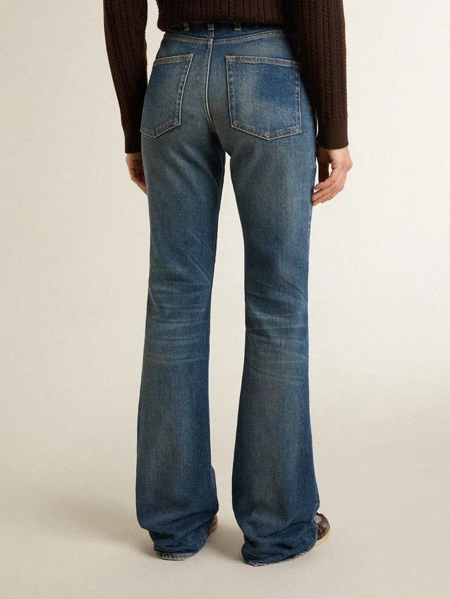 Bootcut-jeans för dam med vintage-tvätt och metalliska detaljer