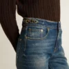 Bootcut-jeans för dam med vintage-tvätt och metalliska detaljer