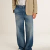 Chinobyxor i denim för herr med slitna detaljer