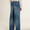 Chinobyxor i denim för herr med slitna detaljer