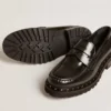 Chunky loafers för damer i svart läder med nitar
