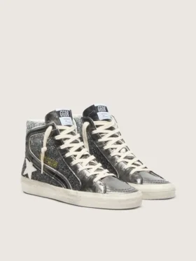 Dam-slides i svart och silverglitter med läderstjärna och metallglans