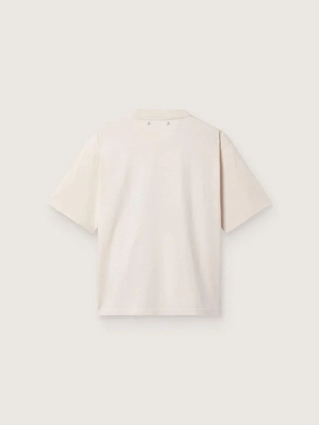 Dam-T-shirt i vit bomullsjersey med stjärntryck