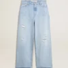 Dambyxor i denim med sliten look