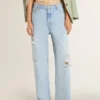 Dambyxor i denim med sliten look