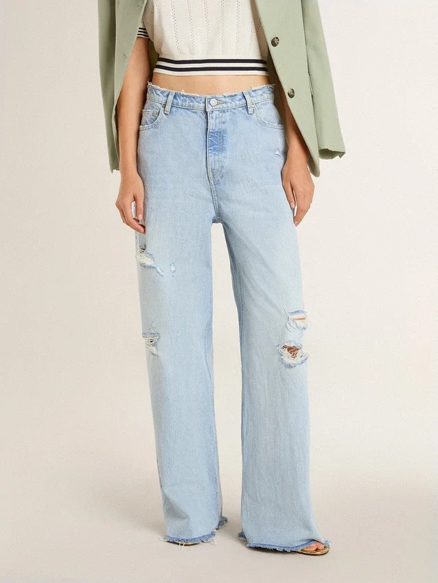 Dambyxor i denim med sliten look