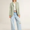Dambyxor i denim med sliten look