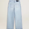 Dambyxor i denim med sliten look