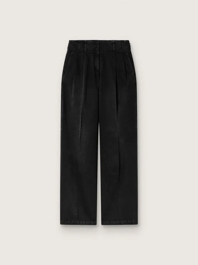 Dambyxor i svart bomullsdenim med sliten look