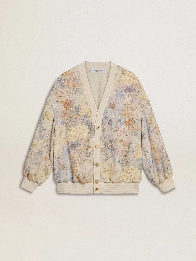 Damkofta med blommönster och broderier