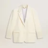 Enradig oversize-kavaj i vitt med sidenlook och broderier