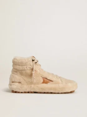 Francy för dam i beige fårskinn med brun läderstjärna