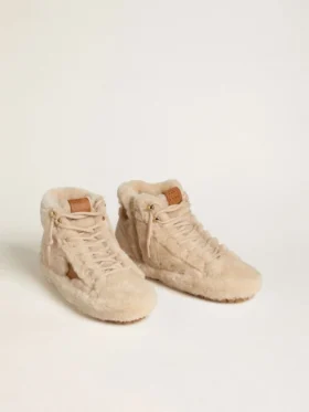 Francy för dam i beige fårskinn med brun läderstjärna