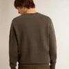 Grå herrsweatshirt med logotyp och sliten look