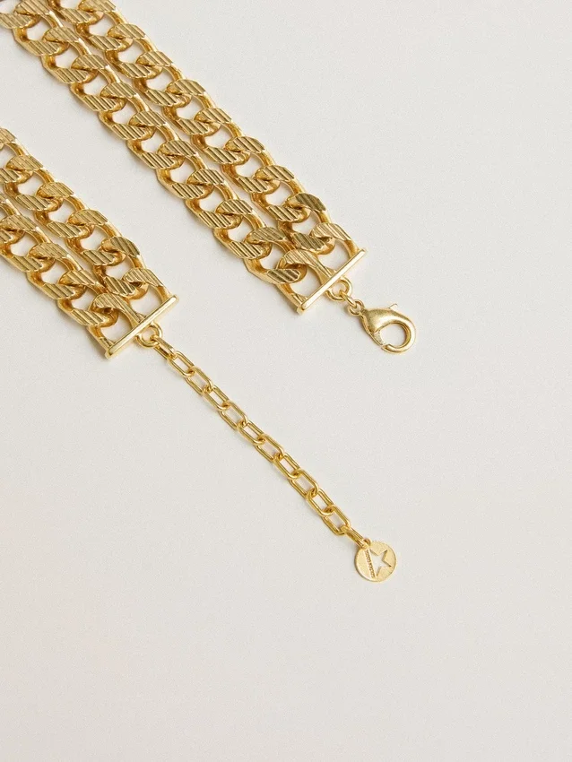 Halsband i antikguldfärgad flätad kedja med stjärnformat lås