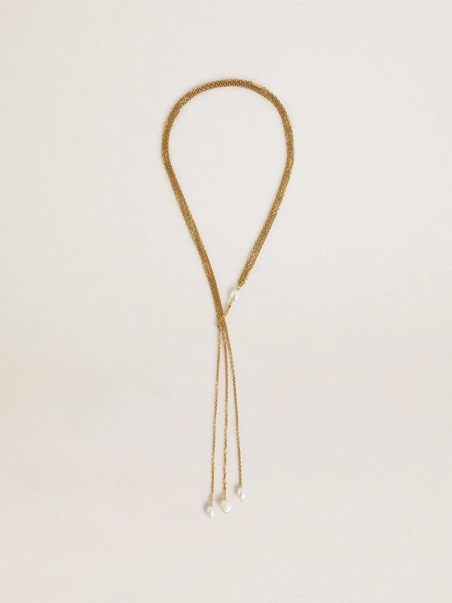 Halsband med antikguldfärgade kedjor med pärlor