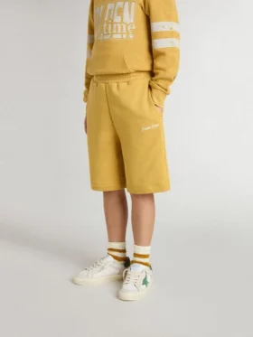 Joggingshorts för barn i ockragult med broderi