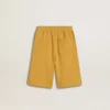 Joggingshorts för barn i ockragult med broderi