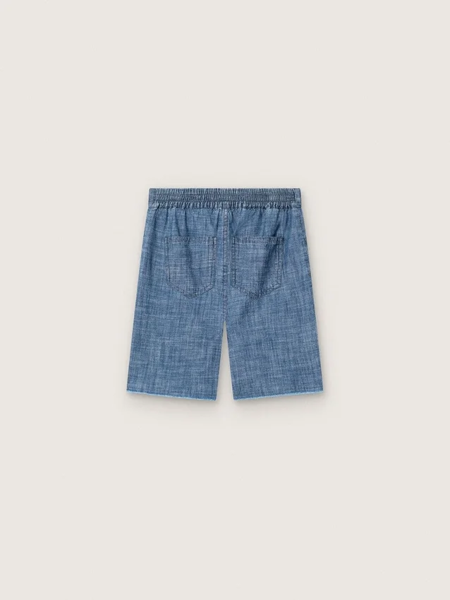 Journey unisex-shorts i ljusblå bomullschambray med broderad logotyp