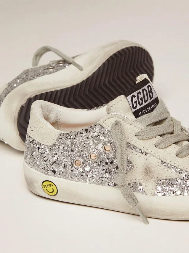 Junior Super-Star med silverglitter och detaljer i mocka