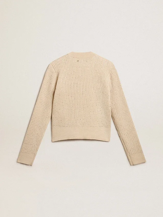 Kort rundhalsad tröja i beige ull med kristaller över hela plagget