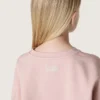 Kort sweatshirt för flickor i rosa bomull med patch och logotyp