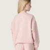 Kort sweatshirt för flickor i rosa bomull med patch och logotyp