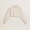 Kort sweatshirt i krämfärgad bomull för damer med kristaller på framsidan