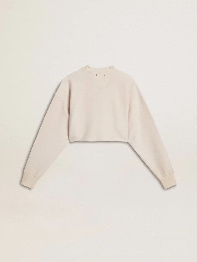 Kort sweatshirt i krämfärgad bomull för damer med kristaller på framsidan