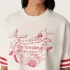 Kort T-shirt för damer i vit bomull med tryck och broderi