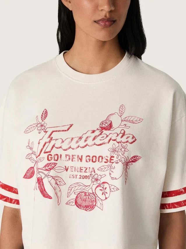 Kort T-shirt för damer i vit bomull med tryck och broderi