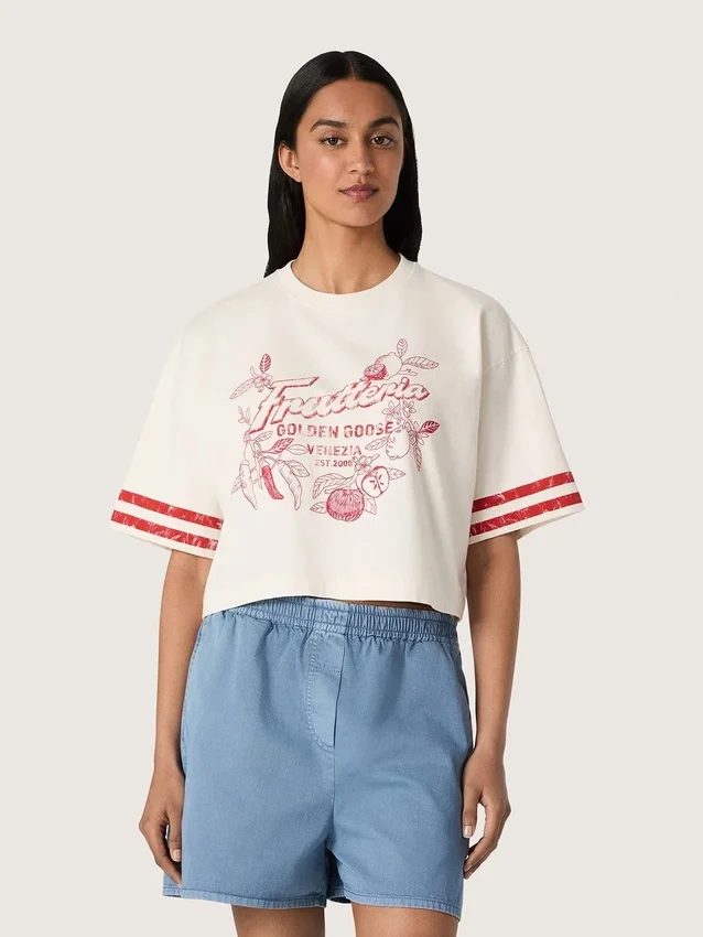 Kort T-shirt för damer i vit bomull med tryck och broderi
