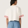 Kort T-shirt för damer i vit bomull med tryck och broderi