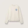 Krämfärgad LTD-tröja med broderad patch