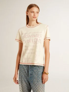 Krämfärgad T-shirt för dam med blekta röda detaljer