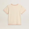 Krämfärgad T-shirt för dam med blekta röda detaljer