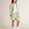 Ljusgröna shorts med vit stjärna