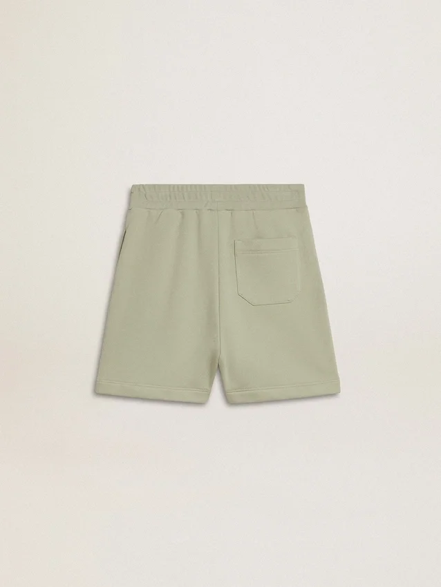 Ljusgröna shorts med vit stjärna