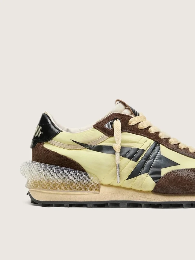 Marathon för damer i limegrön nylon med svart stjärna och insatser i brunt mocka